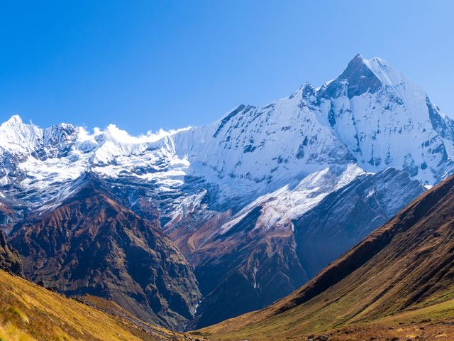 Machhapuchhre or Fishtail Mountain 6,993 m (22,943 ft) by  "Bijay Chaurasia Photography, Wikimedia Commons, License CC-BY-SA 4.0"